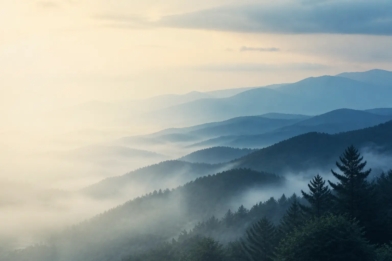 Layered Blue Ridge Mountain ridgelines above misty valleys near Asheville, North Carolina